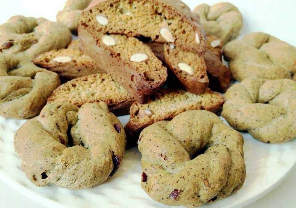 Pane di mandorle e biscotti alle noci con gocce di cioccolato, dolci tipici italiani fatti in casa, ideali per colazione o merenda, ricetta semplice e gustosa.