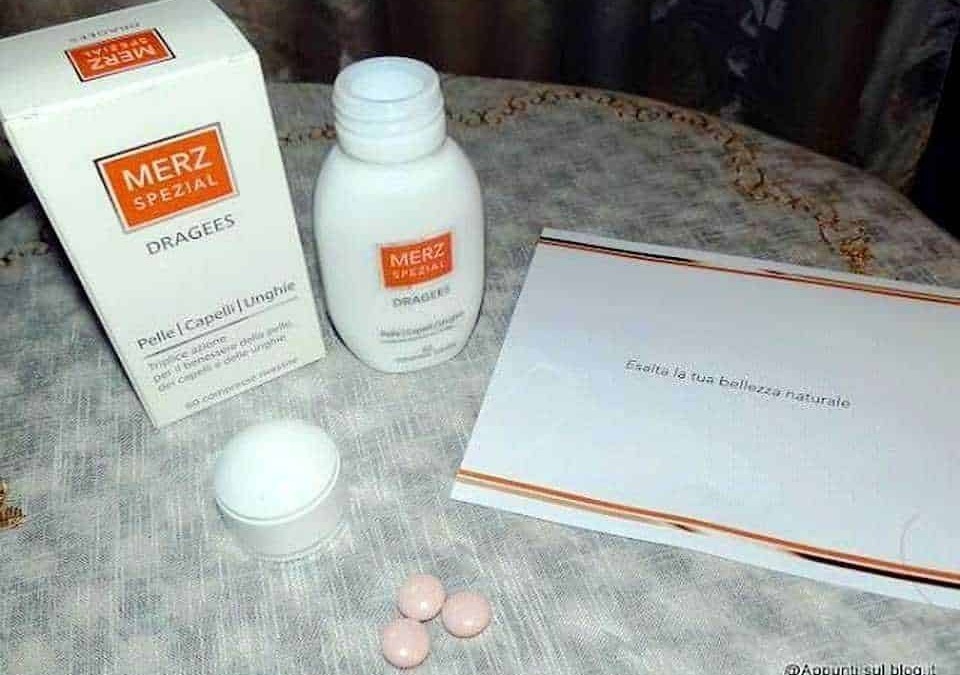 Merz Spezial dragees integratori per la pelle capelli e unghie, in confezione e scatola su tovaglia, con foglio di carta con scritta "Eccati la tua bellezza naturale".