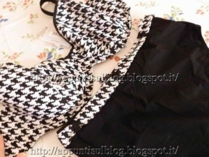 Hanno tessuto a scacchi nero e bianco, reggiseno e pantaloni qui mostrati, stile casual e alla moda, perfetti per outfit di tutte le occasioni.