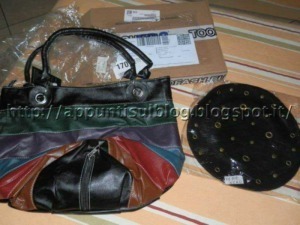 Borsa multicolore in pelle con manici in pelle nera e dettagli colorati, accessorio di moda elegante e versatile for women a tema fashion e stile casual.