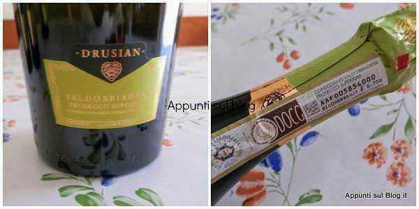 Bottiglia di Prosecco Drusian in vetro con etichetta e laccetto di protezione.