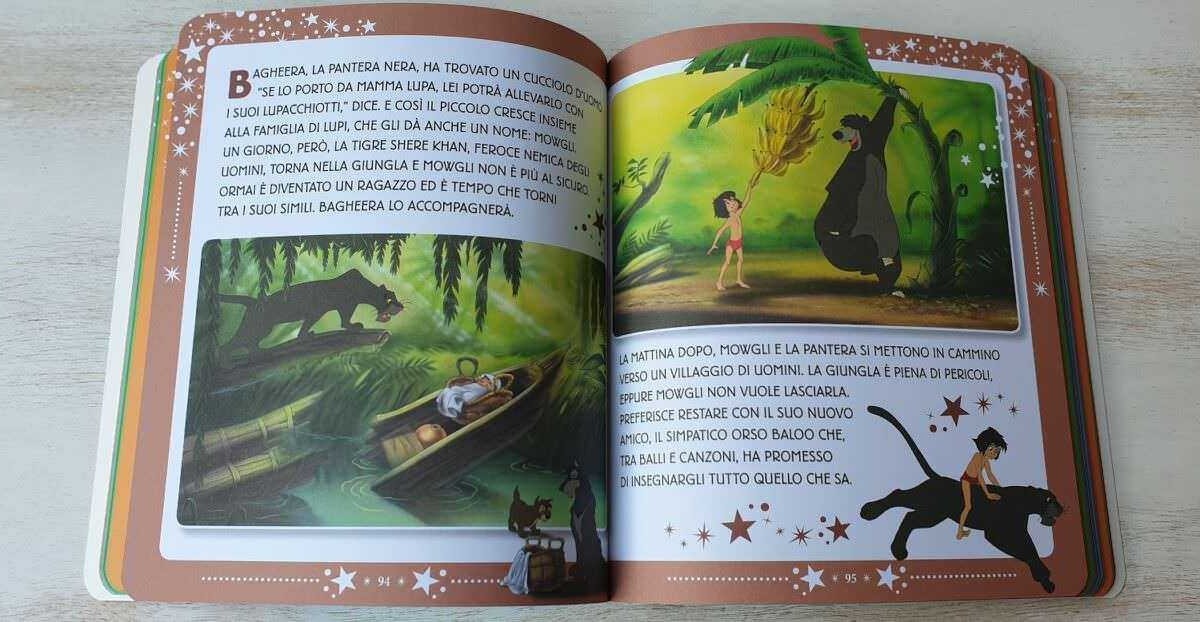 Un libro illustrato con pagine a colori che racconta una storia di animali nella giungla, con immagini di una tigre, un ragazzino e una pantera nera, ispirato alla narrativa per bambini e poesia.