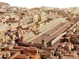 Immagine raffigurante un'antica città romana con arene, colonnati e edifici storici, rappresentante l'architettura e il patrimonio storico di Roma.