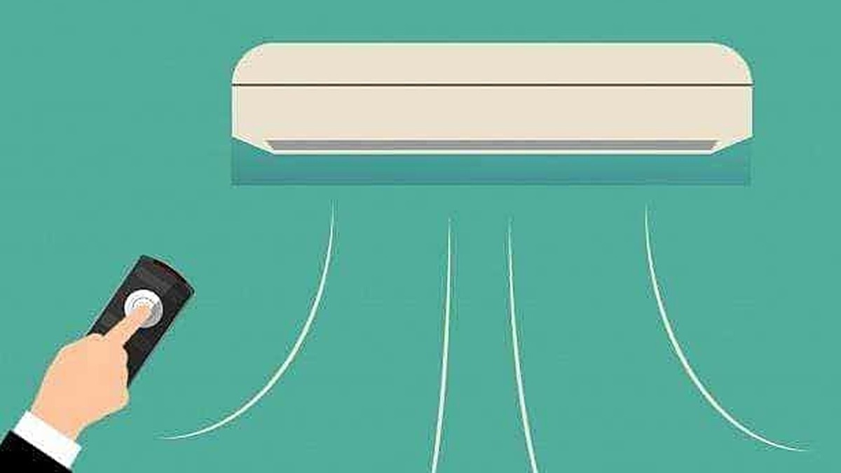 Climatizzatore acceso con telecomando, aria fresca in casa, comfort e aria condizionata, tecnologia per il benessere domestico, dispositivo di raffreddamento efficiente.