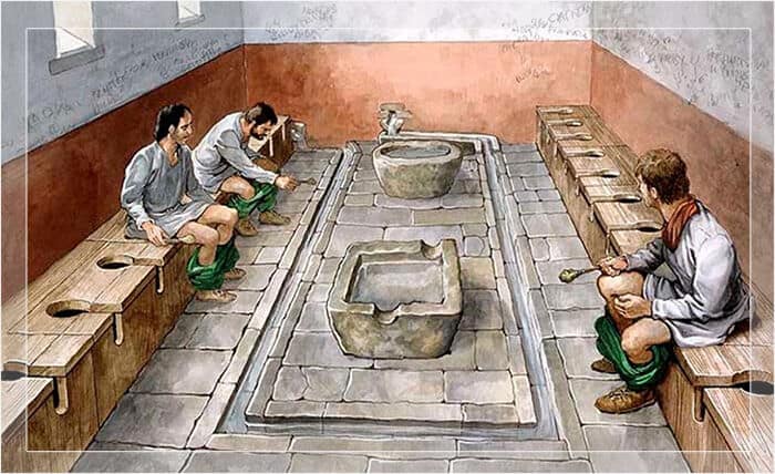 Lavabo storico romano con fontana e arredi in pietra, scene di vita antica in un ambiente ricostruito. Perfetto esempio di architettura e cultura romana antica, ideali per appunti sul blog su storia e patrimonio culturale.
