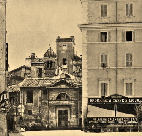 Vecchio scorcio di un quartiere storico con edifici antichi e un'atmosfera d'epoca, in nero e bianco, evidenziando l'architettura tradizionale italiana.