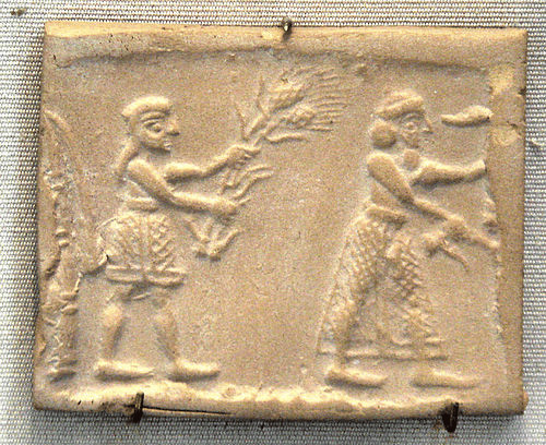 terracotta con raffigurazioni di antichi lavoratori sumeri,